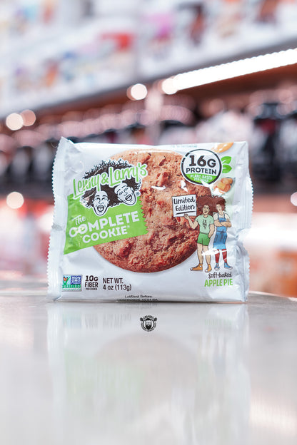 Package of Lenny & Larry's 'The Complete Cookie' Apple Pie flavour with branding and product details on a blurred background