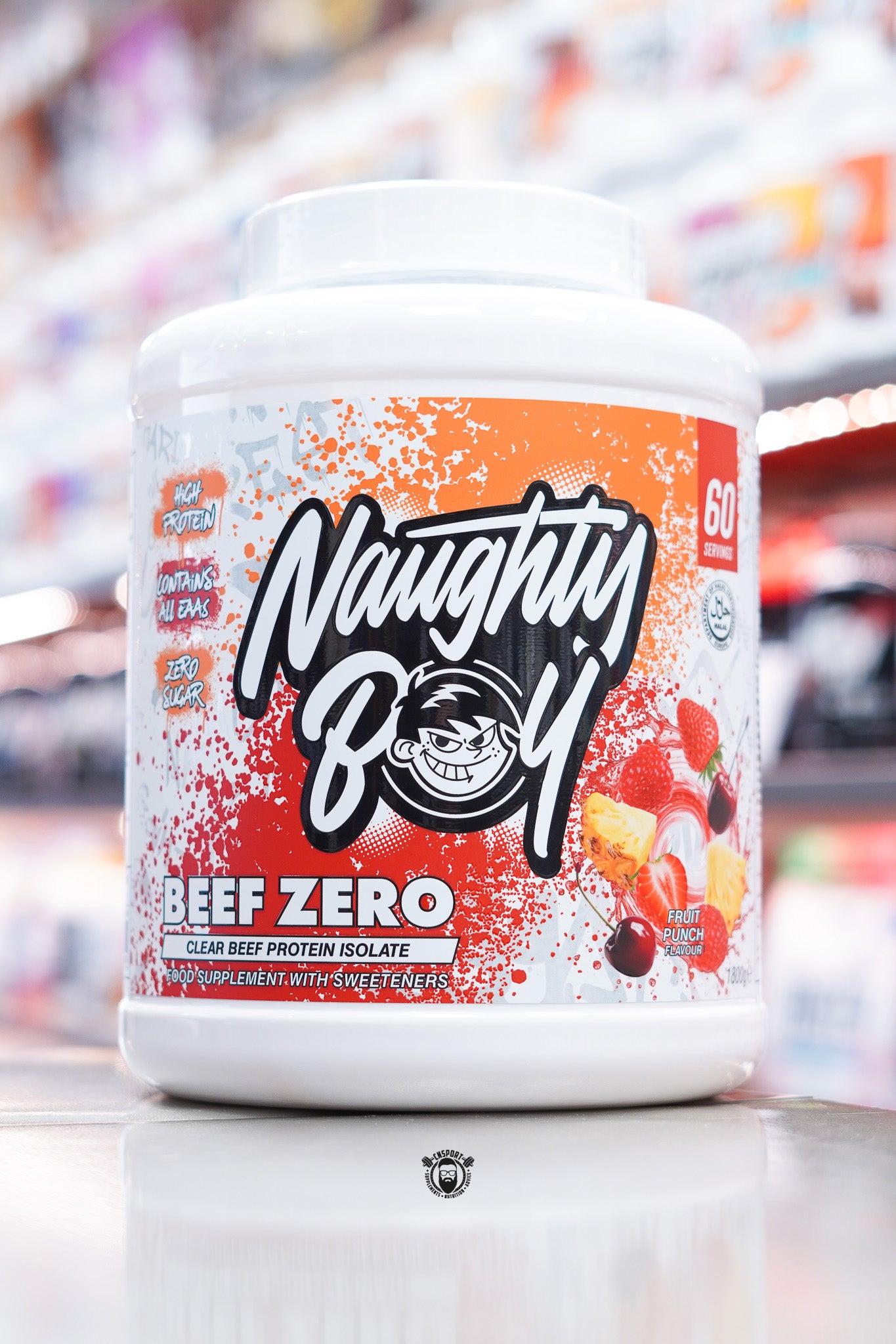 Front of Naughty Boy Beef Zero Fruit Punch 1.8kg tub with red splatter design, Naughty Boy logo, and fruit punch imagery including strawberries, raspberries, and pineapple.