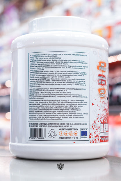 Side label of Naughty Boy Beef Zero Fruit Punch, featuring ingredients and instructions in multiple languages on a white 1.8kg tub.
