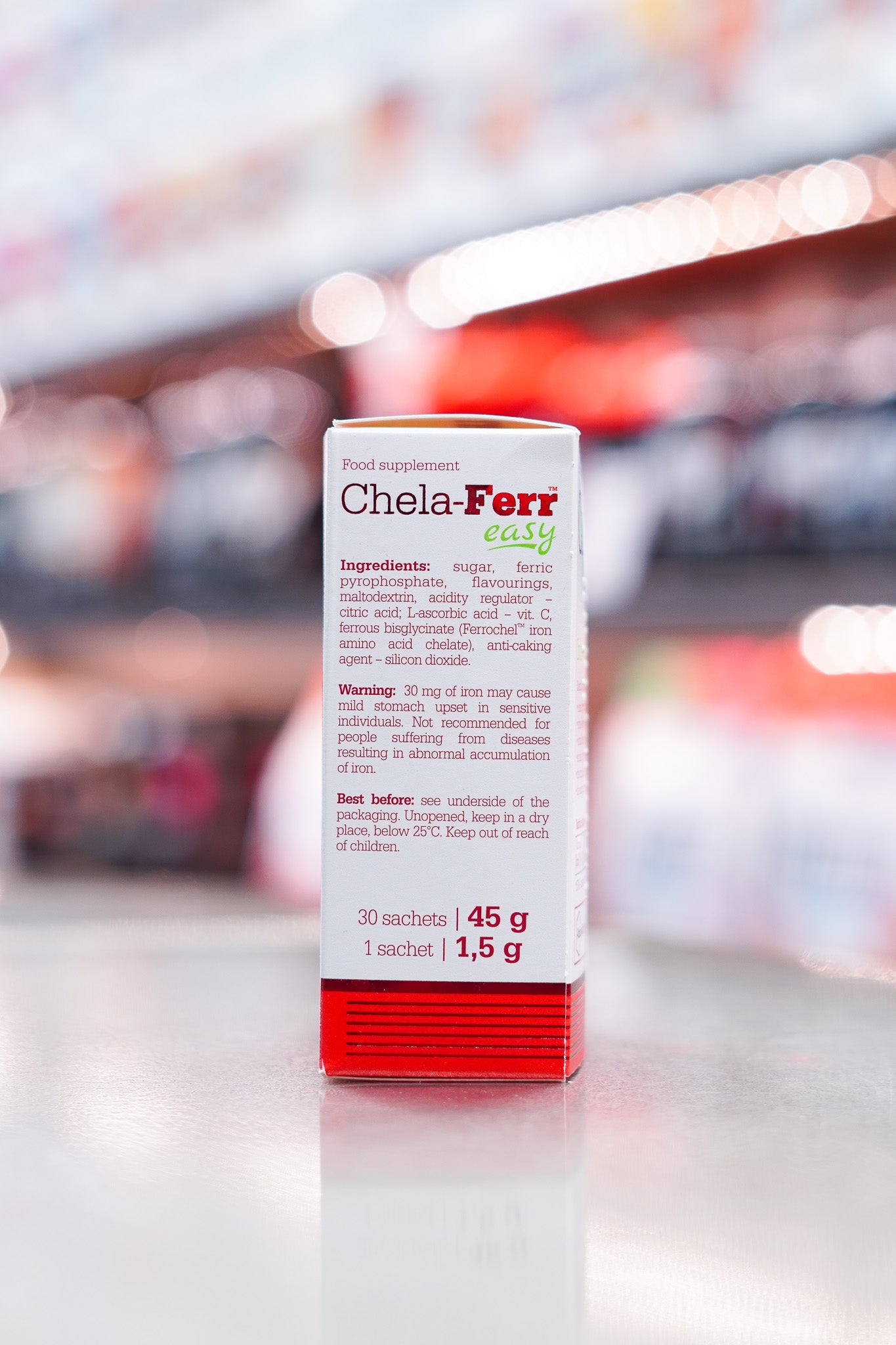 Olimp Labs Chela-Ferr Easy iron supplement box side panel showing ingredients, warnings, and sachet weight information.