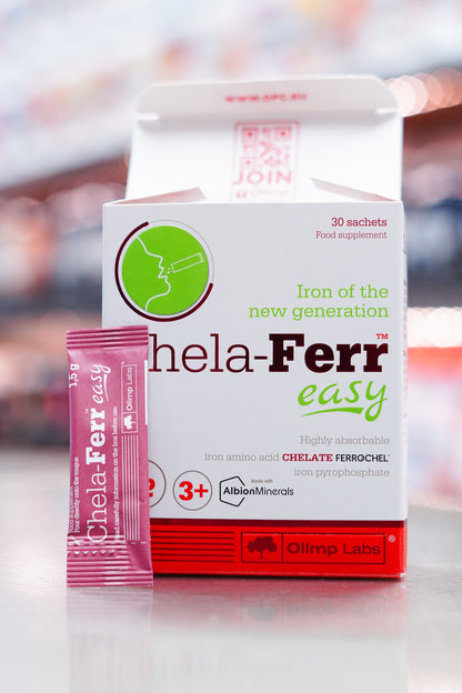 Olimp Labs Chela-Ferr Easy iron supplement open box with individual sachet displayed next to the packaging.