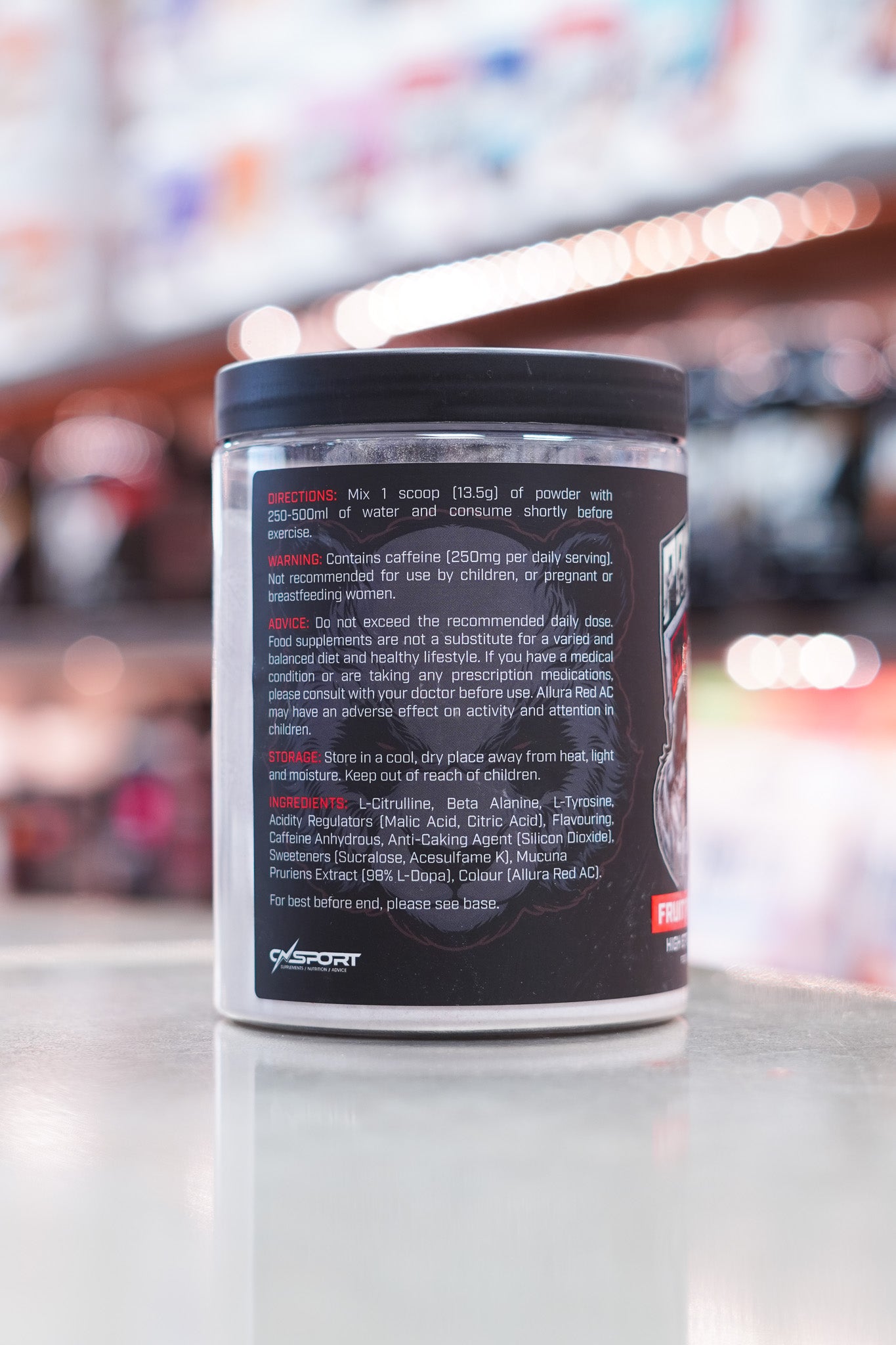 Reverse label image of CNSport Pandamonium Pre-Workout Fruit Punch flavour showing ingredients list, directions, and warnings in white and red text.
