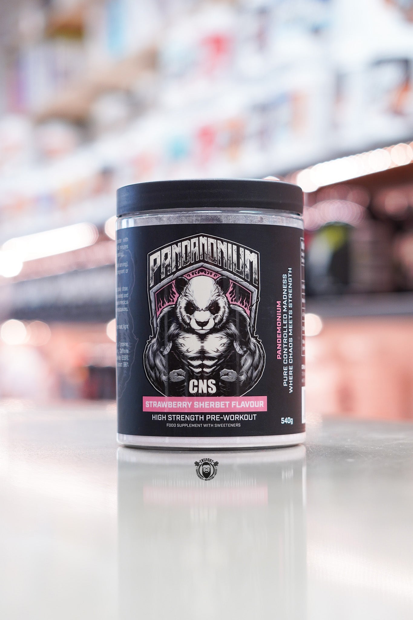 CNSport Pandamonium high strength pre-workout 540g tub, Strawberry Sherbet flavour, displayed on supplement store counter.