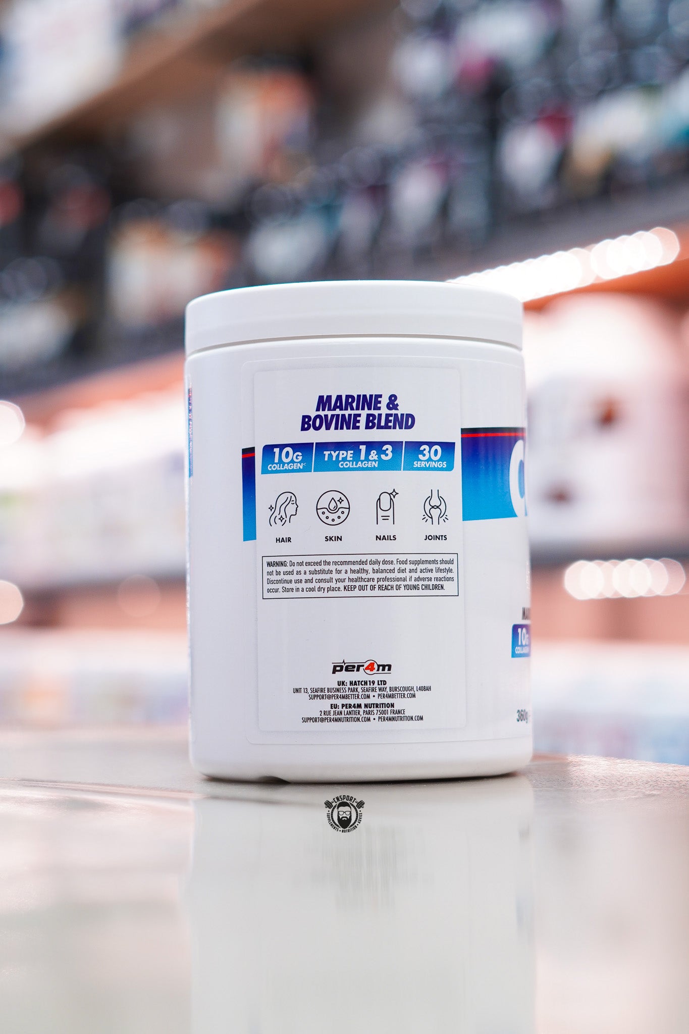 Side panel of Per4m Strawberry Blackcurrant Multi-Blend Collagen showing marine and bovine collagen blend, 10g collagen per serving, 30 servings and suitability for hair, skin, nails and joint support.