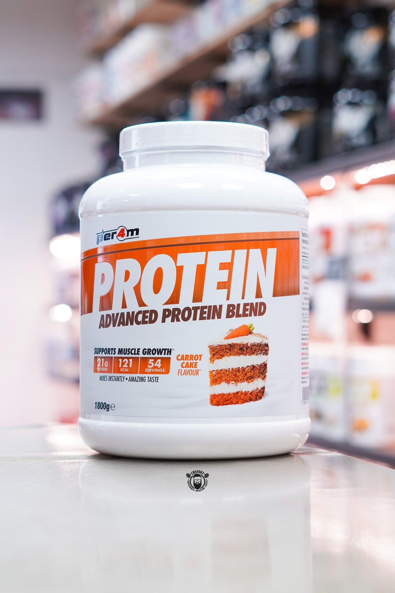 Per4m Protein Advanced Protein Blend 1.8kg Carrot Cake flavour protein powder tub.