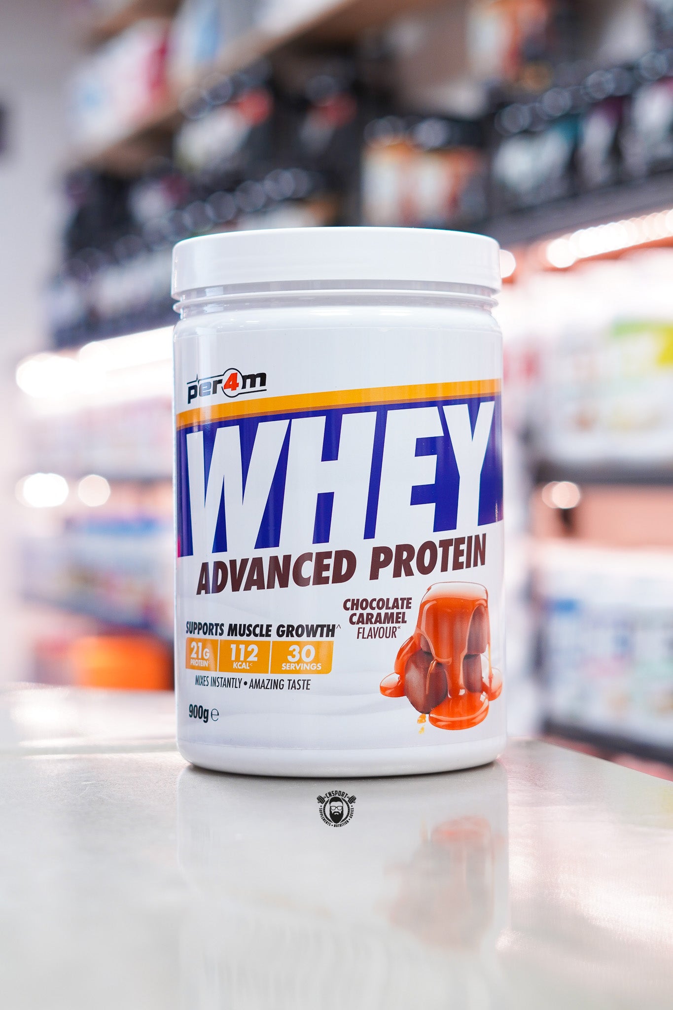 Per4m Whey Advanced Protein in Chocolate Caramel flavour, providing 21g of protein per serving in a smooth-mixing whey protein formula with 30 servings per 900g tub to support muscle growth and recovery.