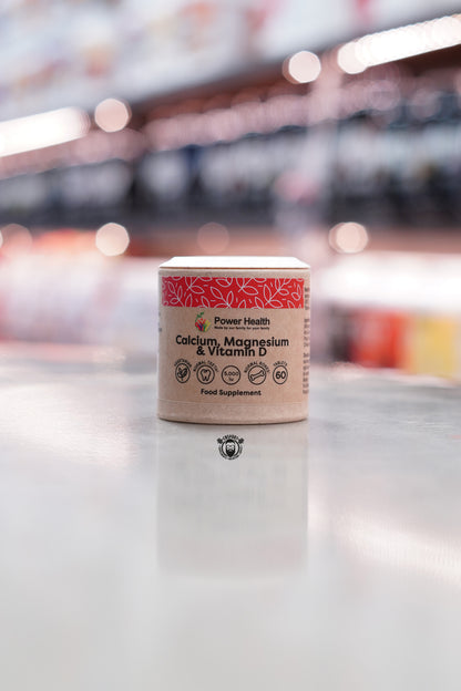 Power Health Calcium, Magnesium & Vitamin D3 supplement, 60 tablets, in a recyclable cardboard tub with red patterned label.