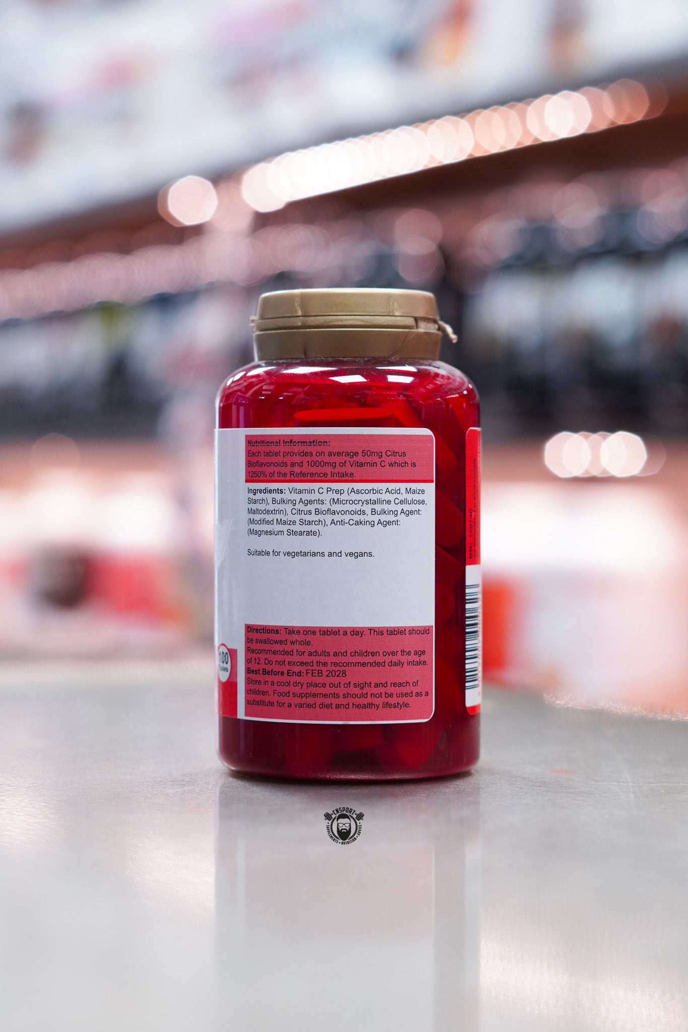 Nutritional information panel listing 1000mg Vitamin C and 50mg Citrus Bioflavonoids per tablet, with ingredients including ascorbic acid, maize starch, maltodextrin, modified maize starch, magnesium stearate; directions for use and vegan suitability.