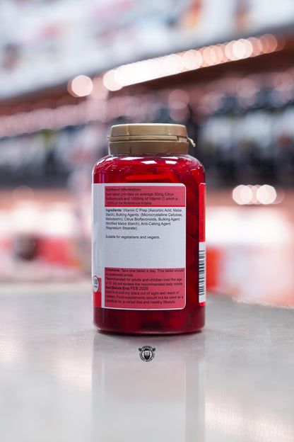 Nutritional information panel listing 1000mg Vitamin C and 50mg Citrus Bioflavonoids per tablet, with ingredients including ascorbic acid, maize starch, maltodextrin, modified maize starch, magnesium stearate; directions for use and vegan suitability.