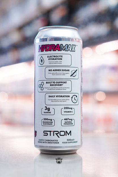 Strom HydraMax Berrylicous hydration drink can made with real coconut water on retail counter with blurred supplement store background