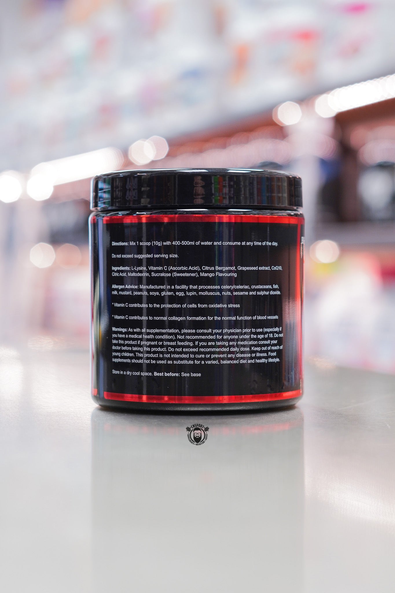 Strom Sports LipidMax Mango flavour supplement tub showing ingredients, directions, and warnings label