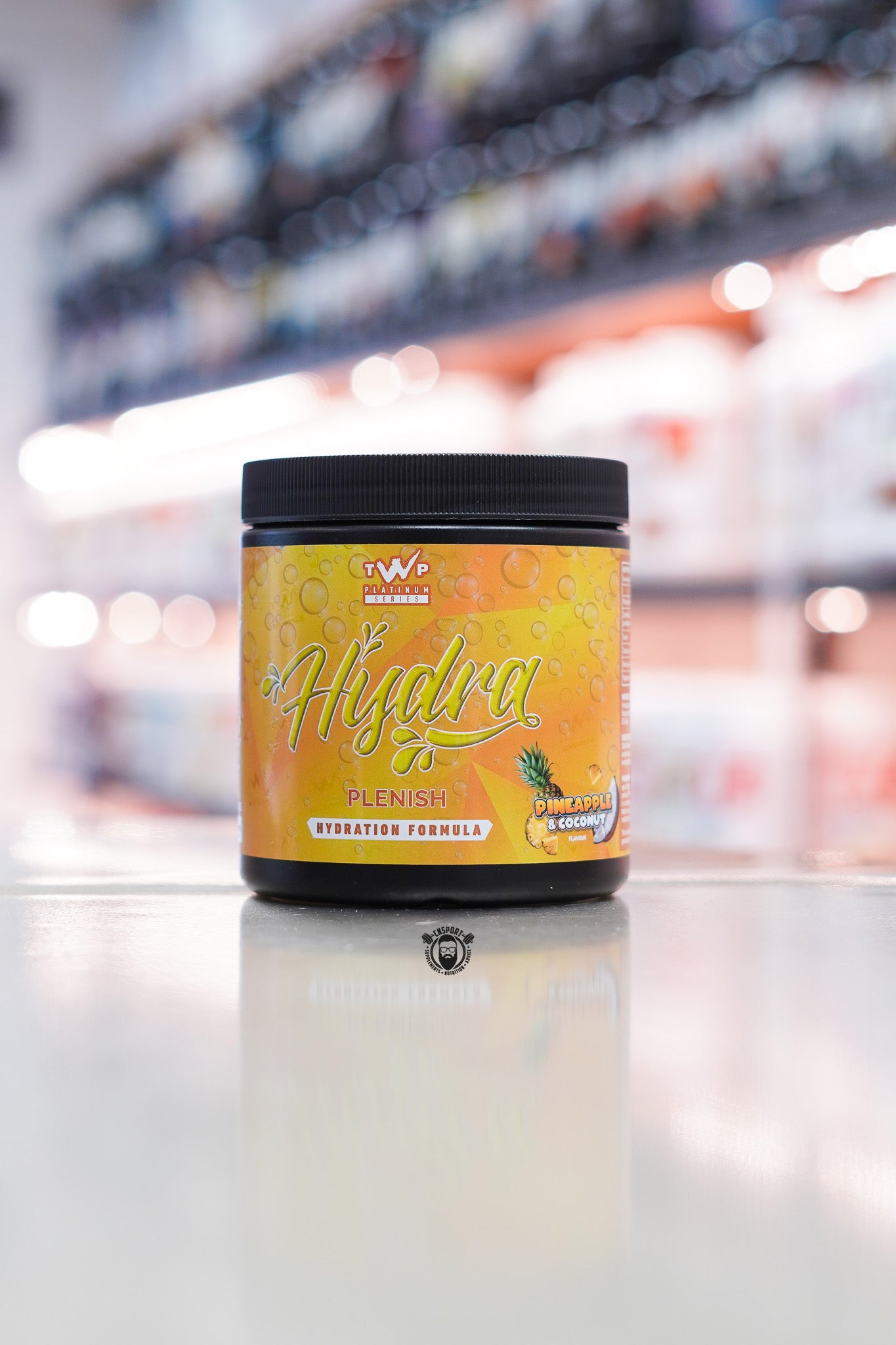 TWP Hydra Plenish hydration formula, Pineapple and Coconut flavour, 30 servings tub with yellow label.