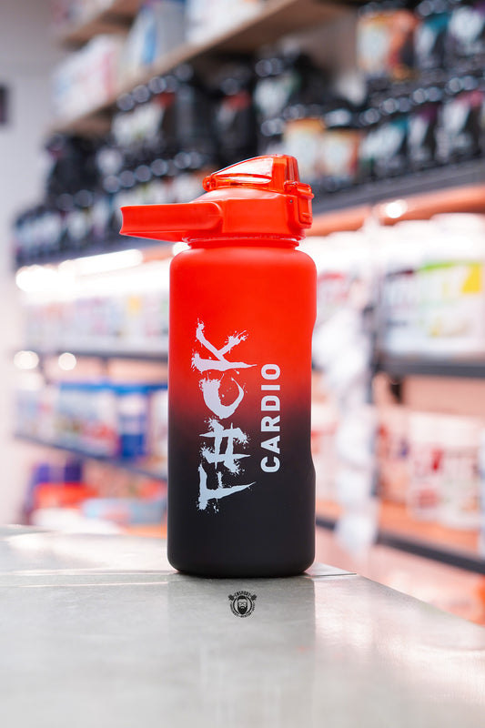 TWP Cardio 2L hydration water bottle with flip-top drinking spout open, featuring a red and black frosted finish, displayed on a supplement store counter.