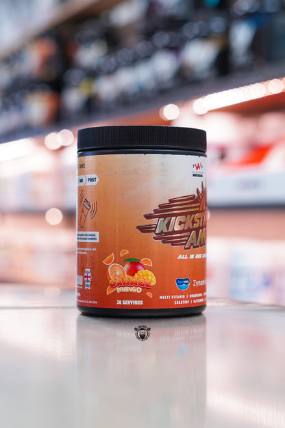 TWP KickStart AM Orange Mango flavour label showing fruit graphic and 30 servings information.
