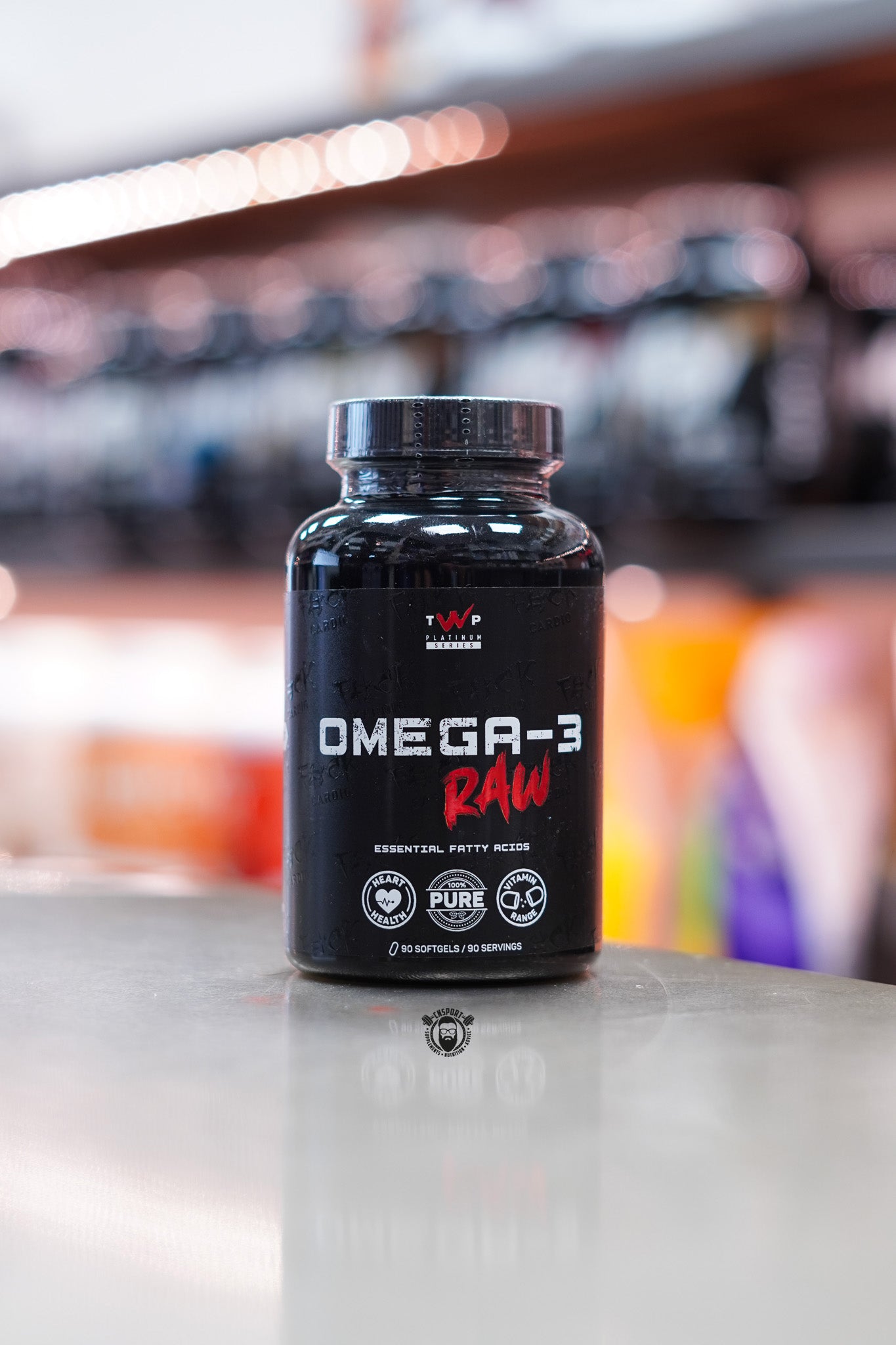 Front-facing image of TWP Platinum Series Omega-3 RAW supplement bottle, displaying bold black and red label design with essential fatty acid and purity claims.