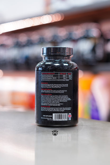 Close-up of the TWP Vit D3 + K2 RAW label showing active ingredients, nutritional values, directions for use, and manufacturer details.