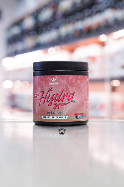 TWP Hydra Plenish hydration formula, Watermelon Crush flavour, 30 servings tub on supplement store counter.