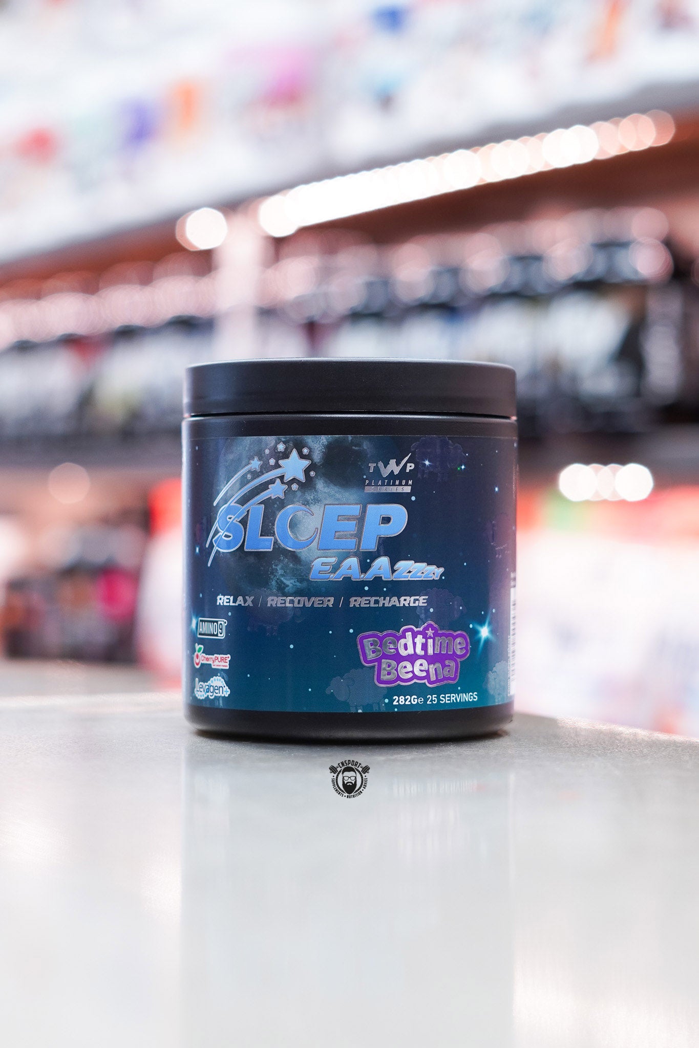 Front-facing image of TWP Sleep EAAzzzy Bedtime Beena flavour, featuring a dark blue cosmic design with stars and relaxing theme elements.