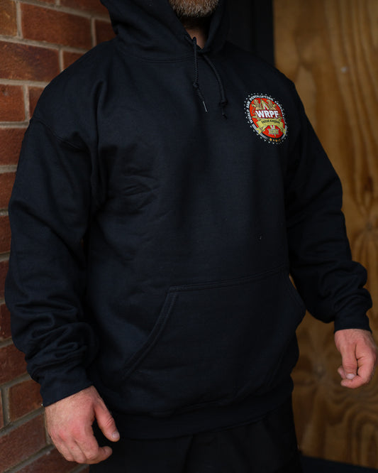 Black WRPF UK hoodie with printed federation logo on left chest.